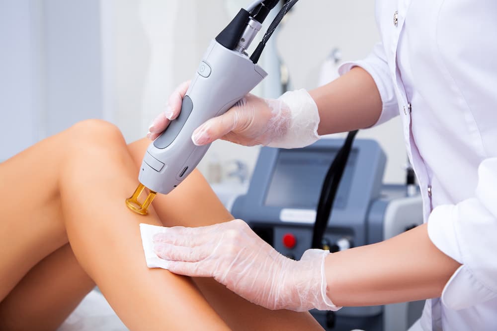Laser hair removal taking place on the legs